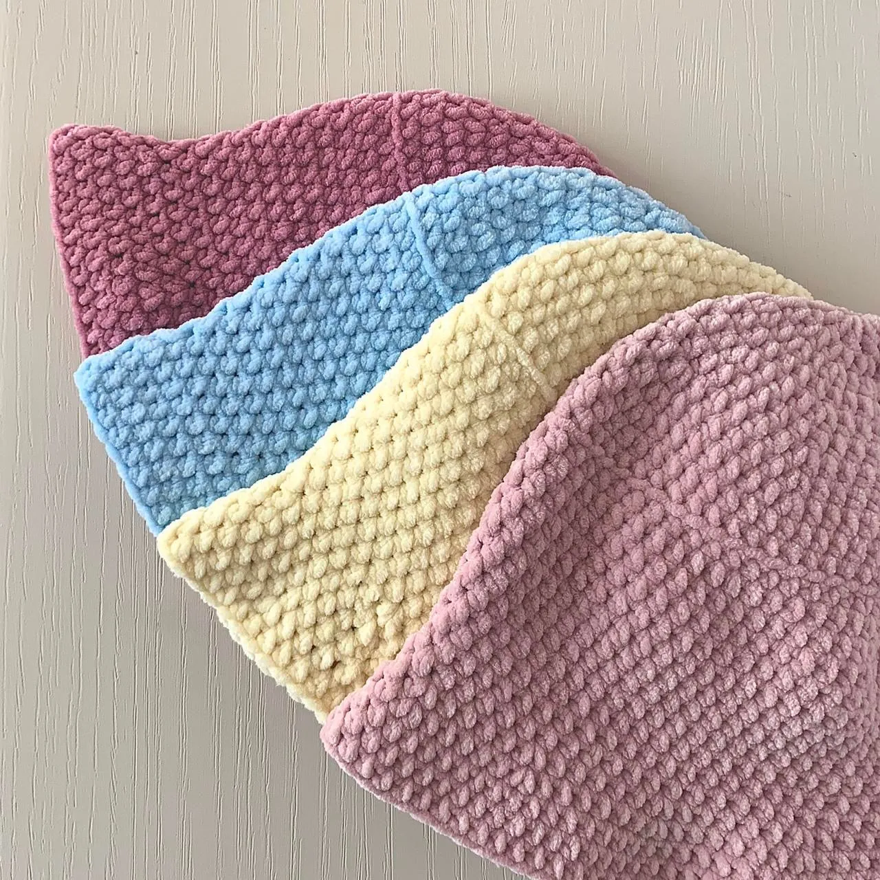 Handmade crushed velvet crochet bucket hat in pastel yellow