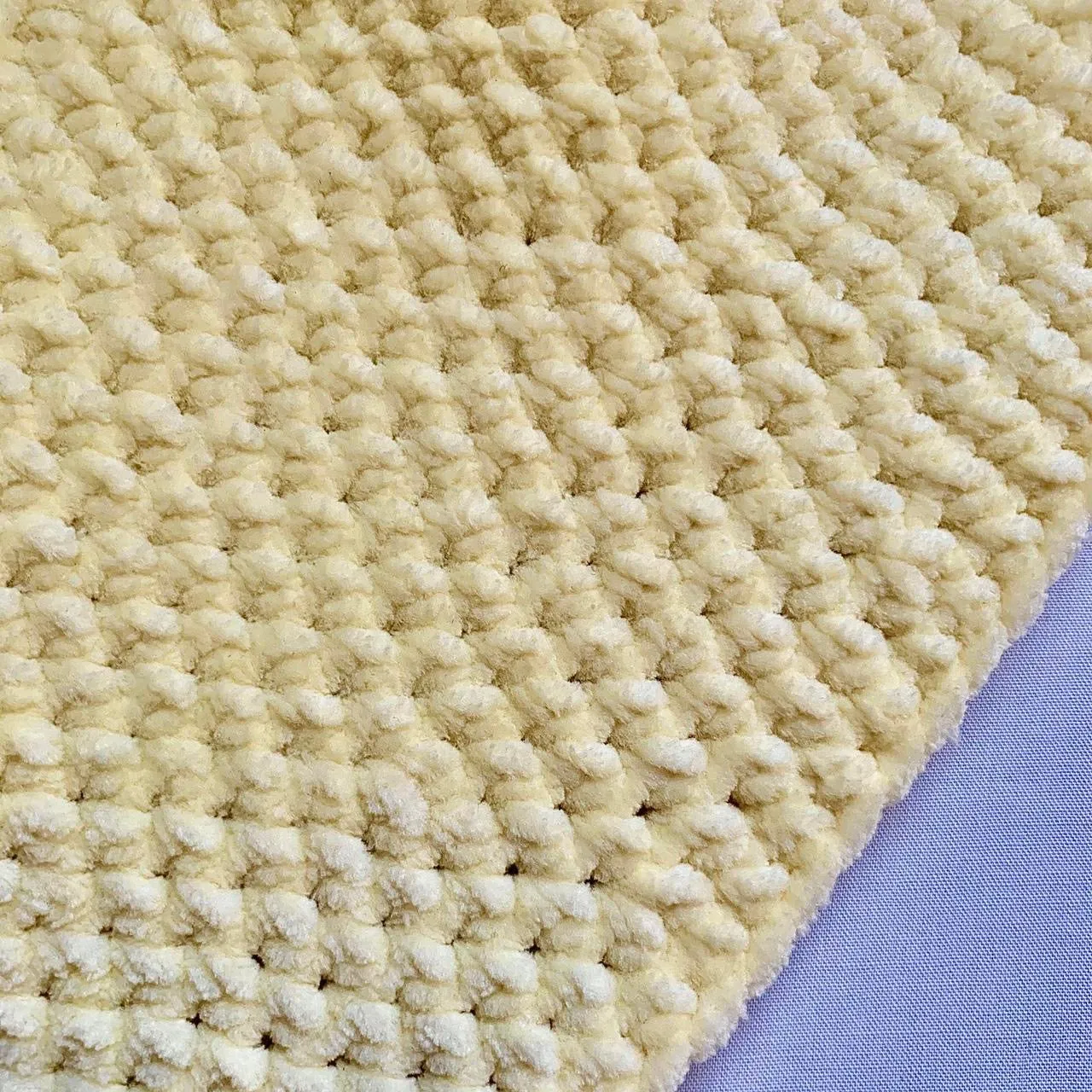 Handmade crushed velvet crochet bucket hat in pastel yellow